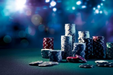 Live AduQ dealer studio with multi-camera angles showing card table and professional dealer